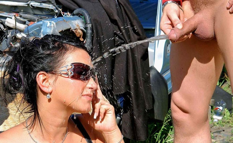Male pissing on the beach
