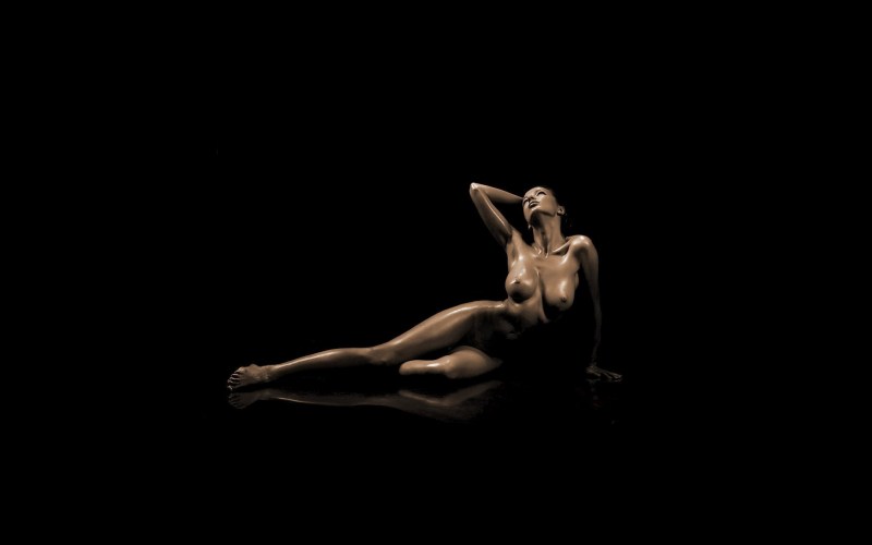 Nude on a black background