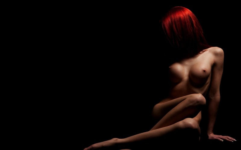 Erotic girls on a dark background