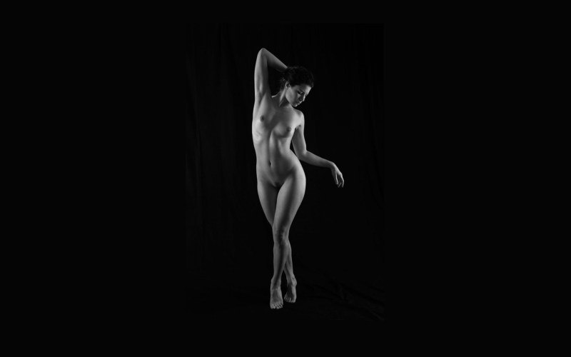 Naked women on a dark background