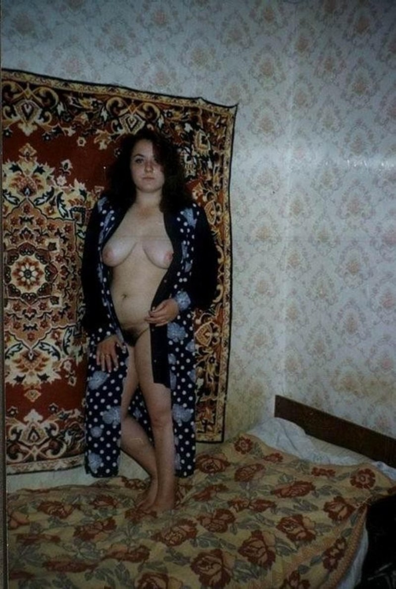 Naked women on the background of carpets