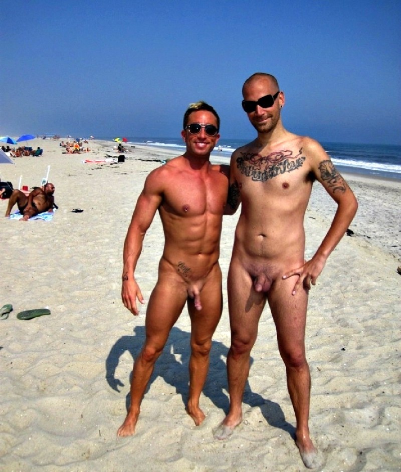 Naked guys with piercing on the beach