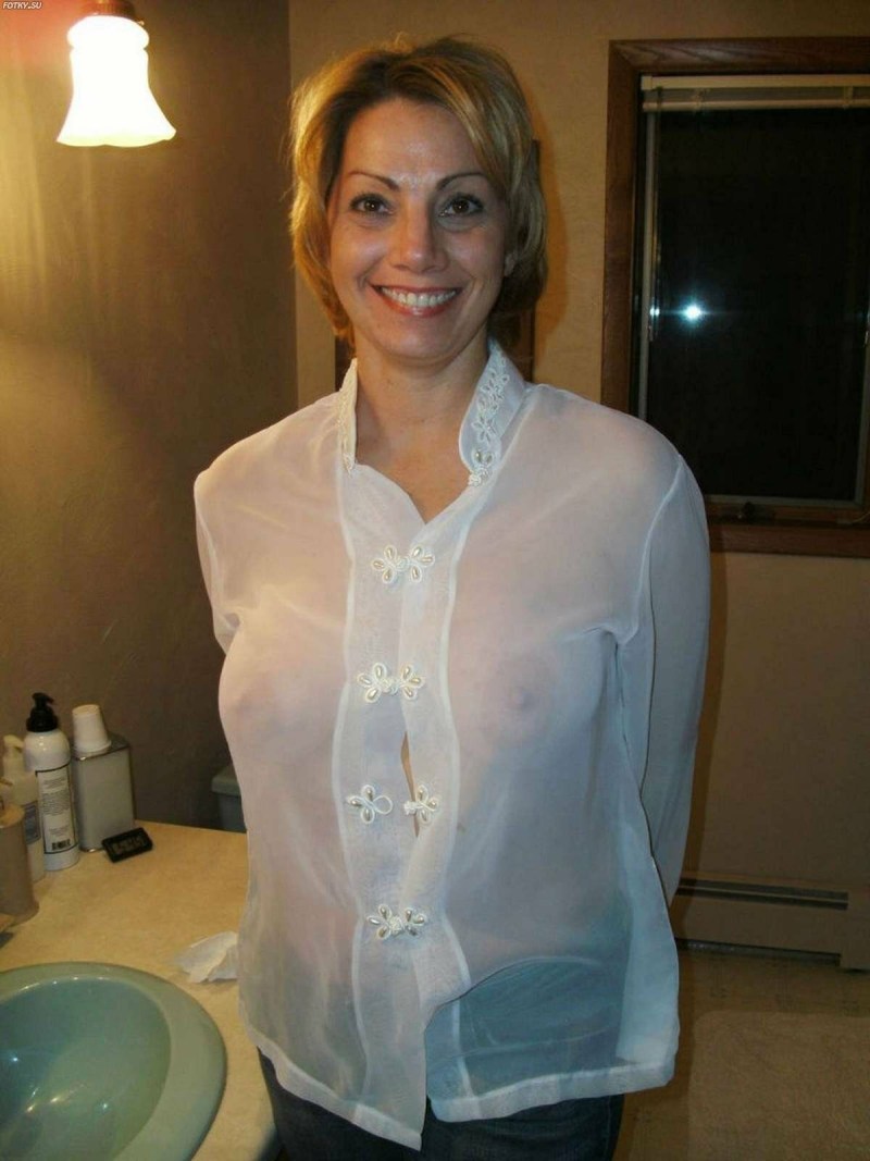 Transparent blouse on a naked body