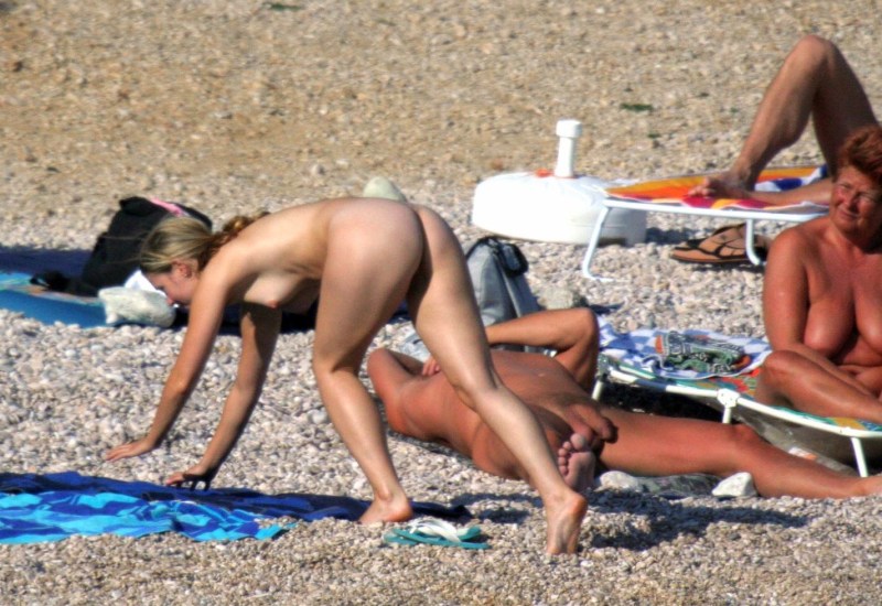 Naked on the beach peeping