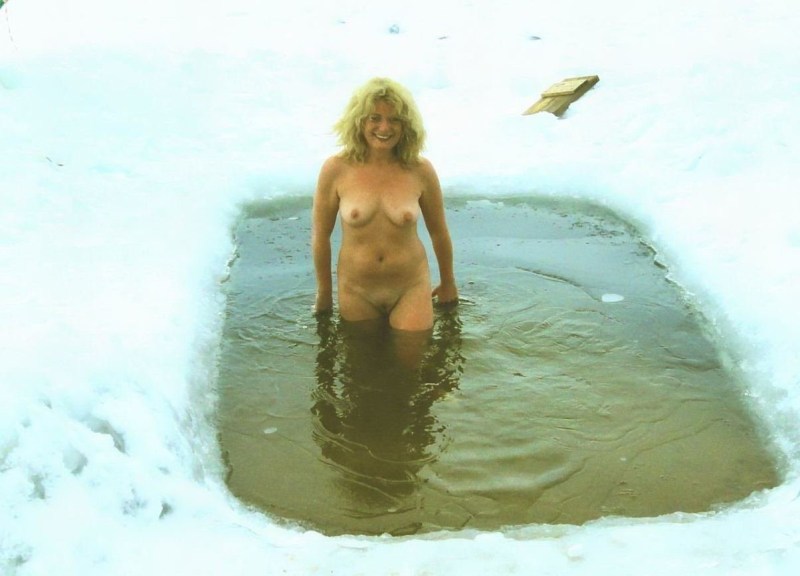 Naked women bathe in the hole