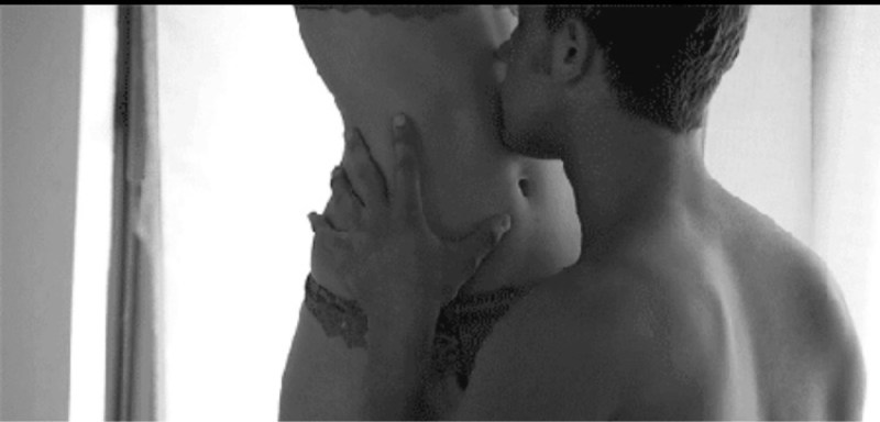 Erotic kiss in the tummy