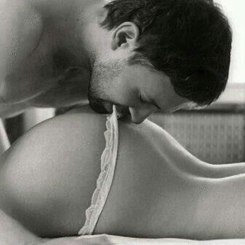 The guy kisses the girl in the ass