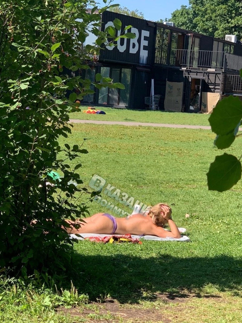 They sunbathe in the park
