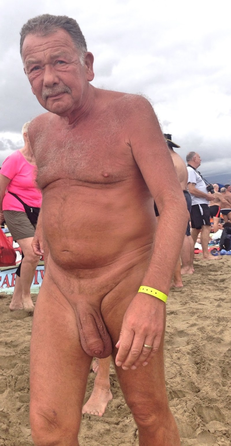 Naked powerful old man beach