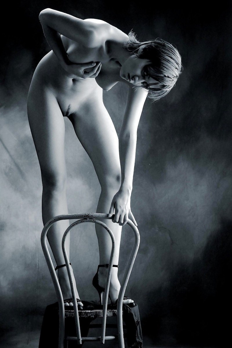 Girls naked in a chair