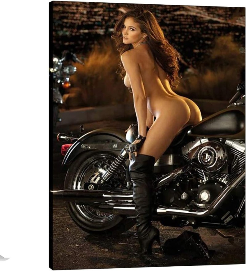 Naked beauty on a motorcycle
