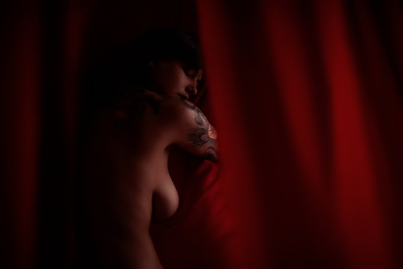 Incognito nude woman at home