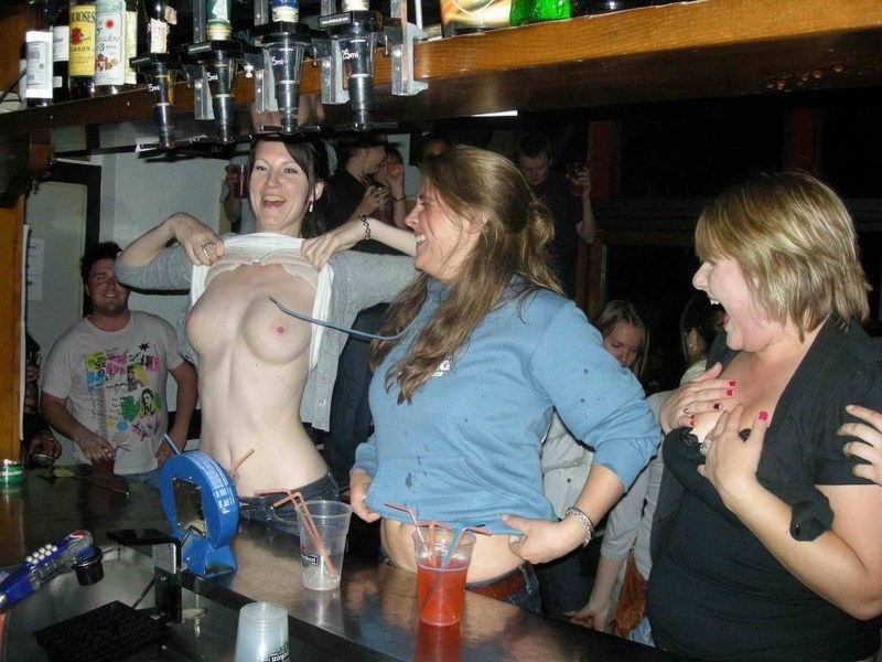 Drunk naked girls in a bar