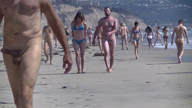 Naked guy on a public beach