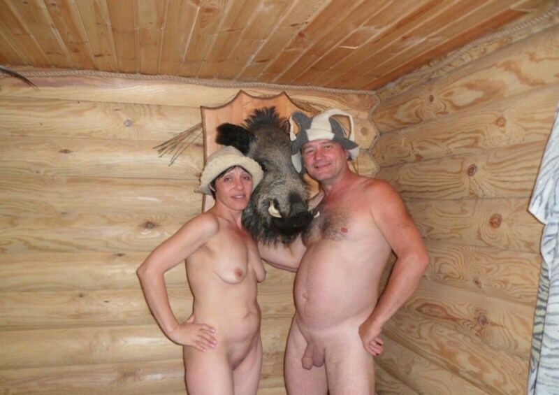 Naked women in a bathhouse with men