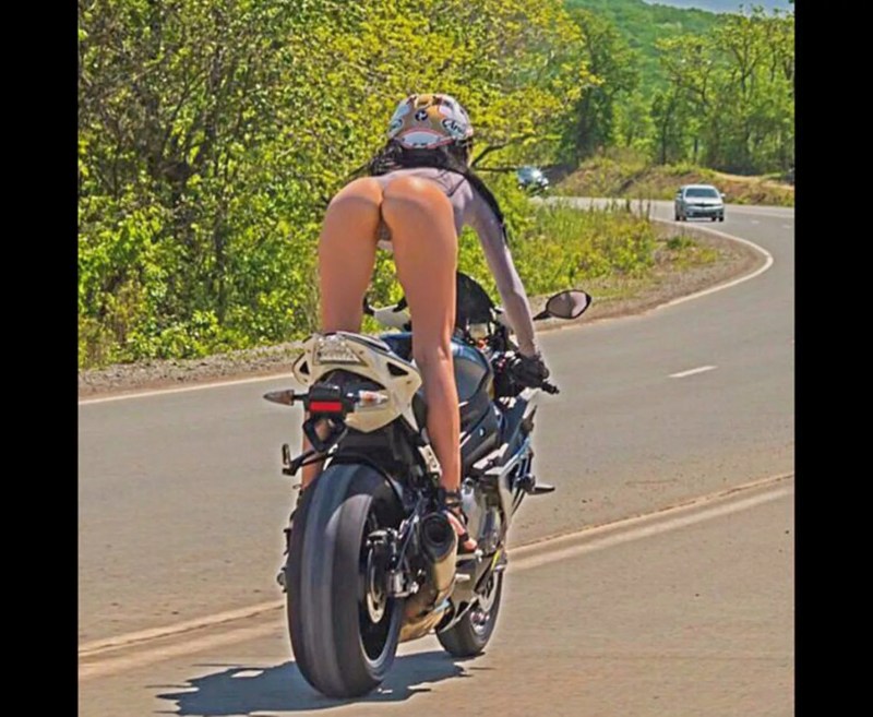 Rides on a motorcycle without panties